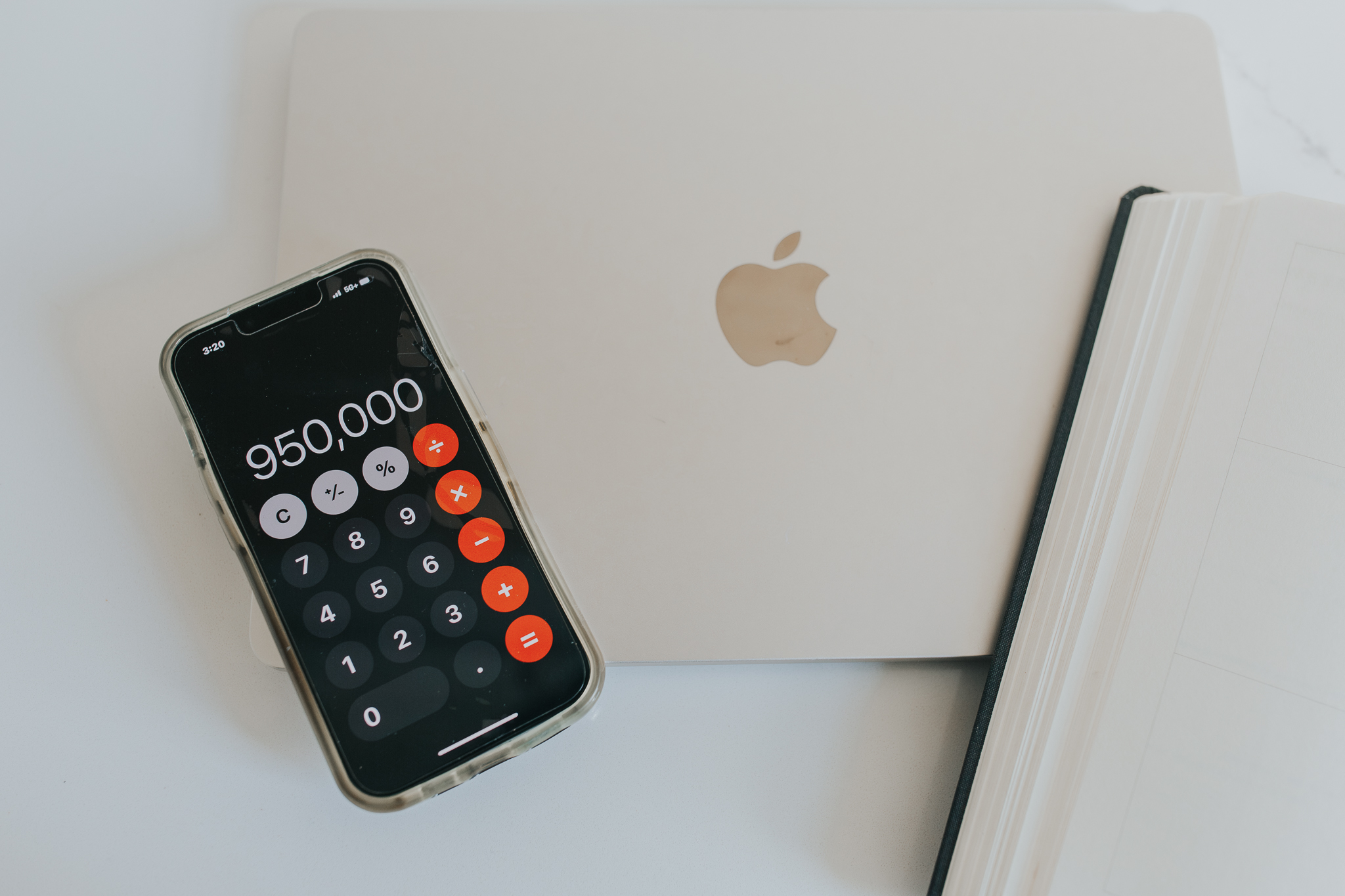 Phone and laptop on a desk