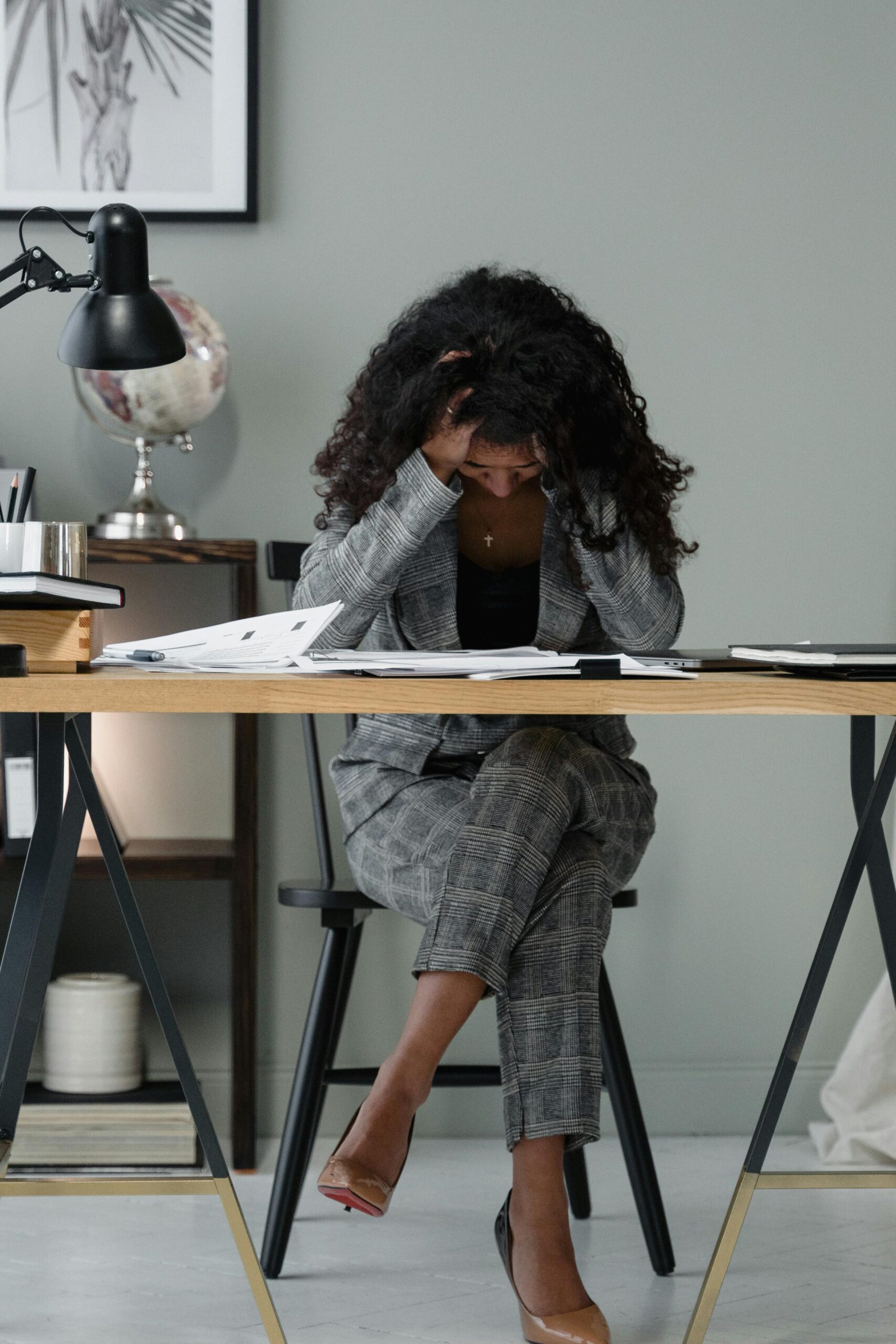 Frustrated agent at desk