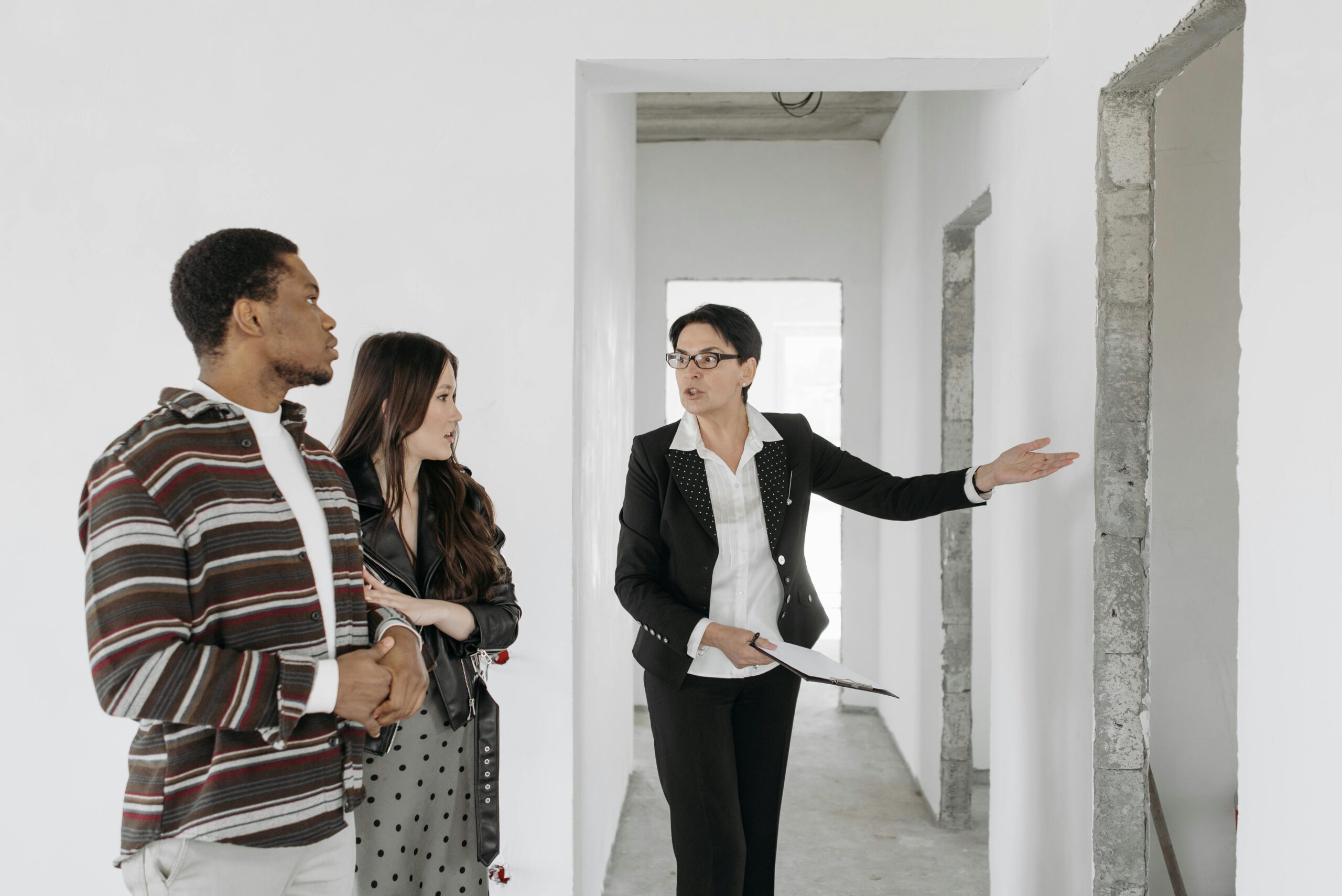 Agent showing a property to clients